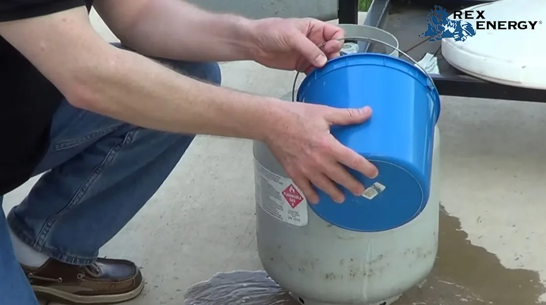 propane tank warm water trick